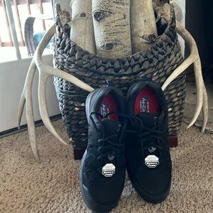 Men’s Skechers air-cooled memory foam size 9.5.  They are new.